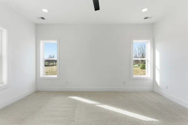 an empty room with windows