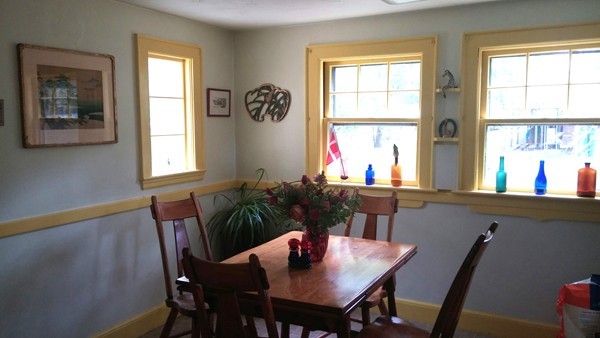 73 Wellesley Road Natick, MA 01760 - Photo 3 of 11 a view of a dining room with furniture and windows