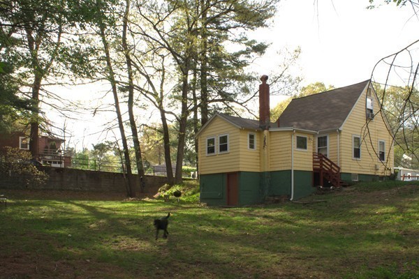 73 Wellesley Road Natick, MA 01760 - Photo 8 of 11 a view of a house with a yard