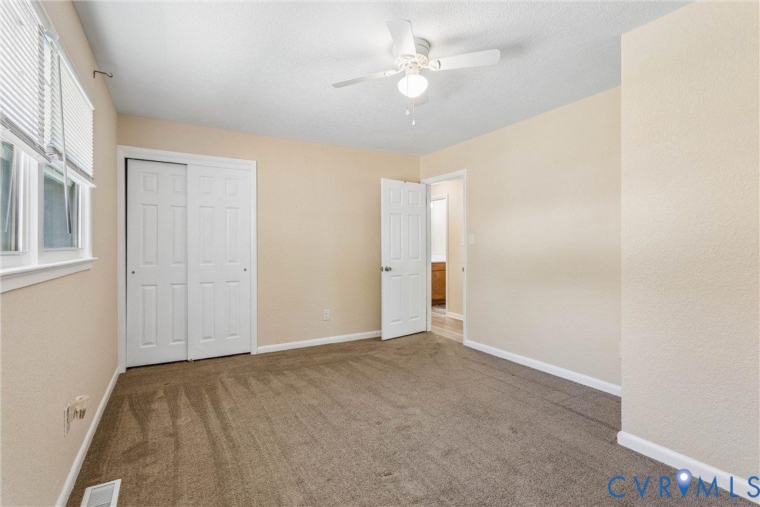 6 Barnes Court Hampton, VA 23664 - Photo 17 of 38 a view of an empty room with a window