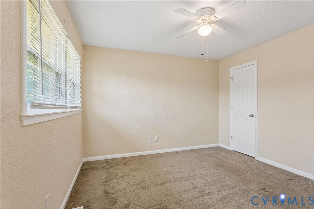 6 Barnes Court Hampton, VA 23664 - Photo 19 of 38 a view of an empty room with a window