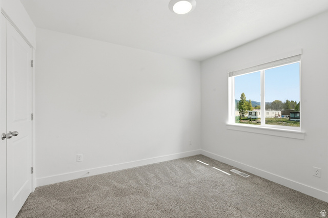 1173 West 1870 South Logan, UT 84321 - Photo 17 of 33 Neutral white walls with matching trim and doors