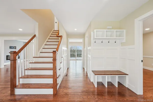 a view of entryway with wooden floor