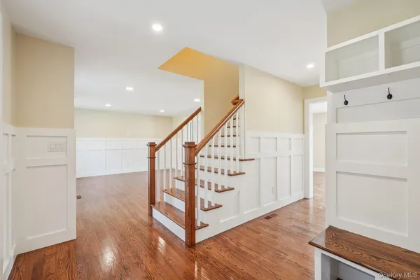 a view of entryway with wooden floor