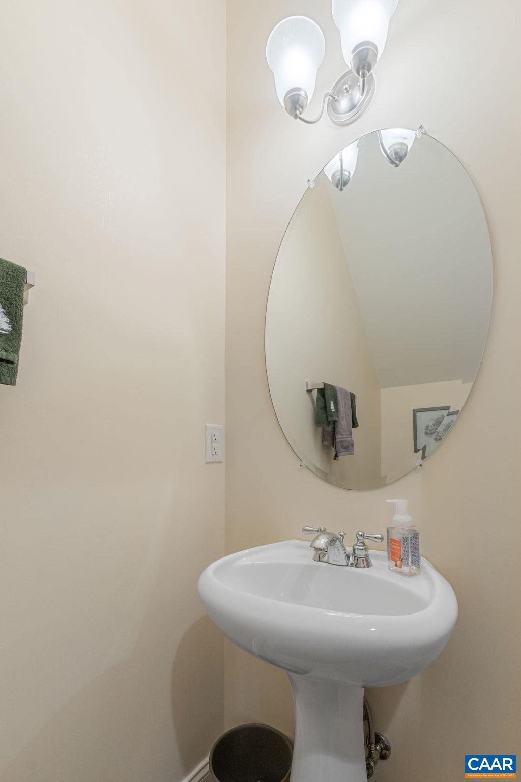 1313 Gate Post Lane Charlottesville, VA 22901 - Photo 26 of 44 a bathroom with a sink a mirror and vanity