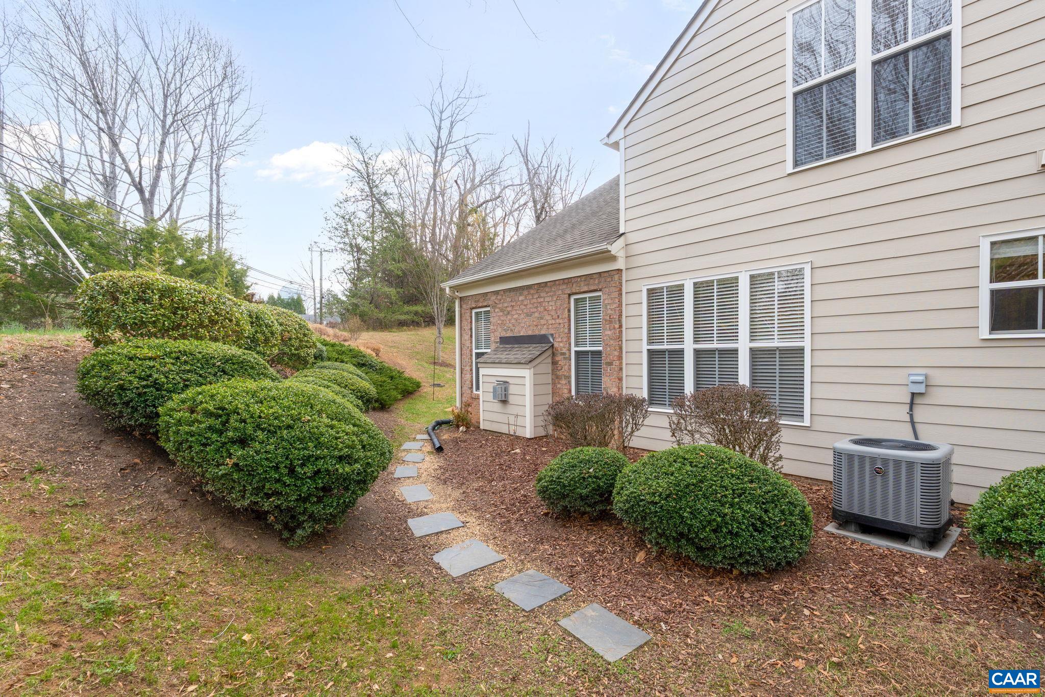 1313 Gate Post Lane Charlottesville, VA 22901 - Photo 38 of 44 a front view of a house with garden