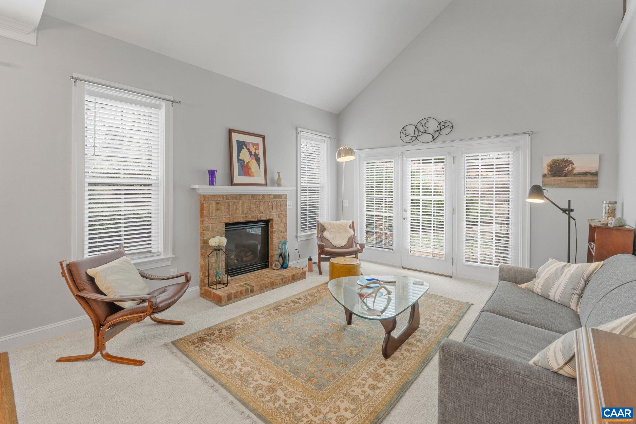 1313 Gate Post Lane Charlottesville, VA 22901 - Photo 10 of 44 a living room with furniture and a fireplace