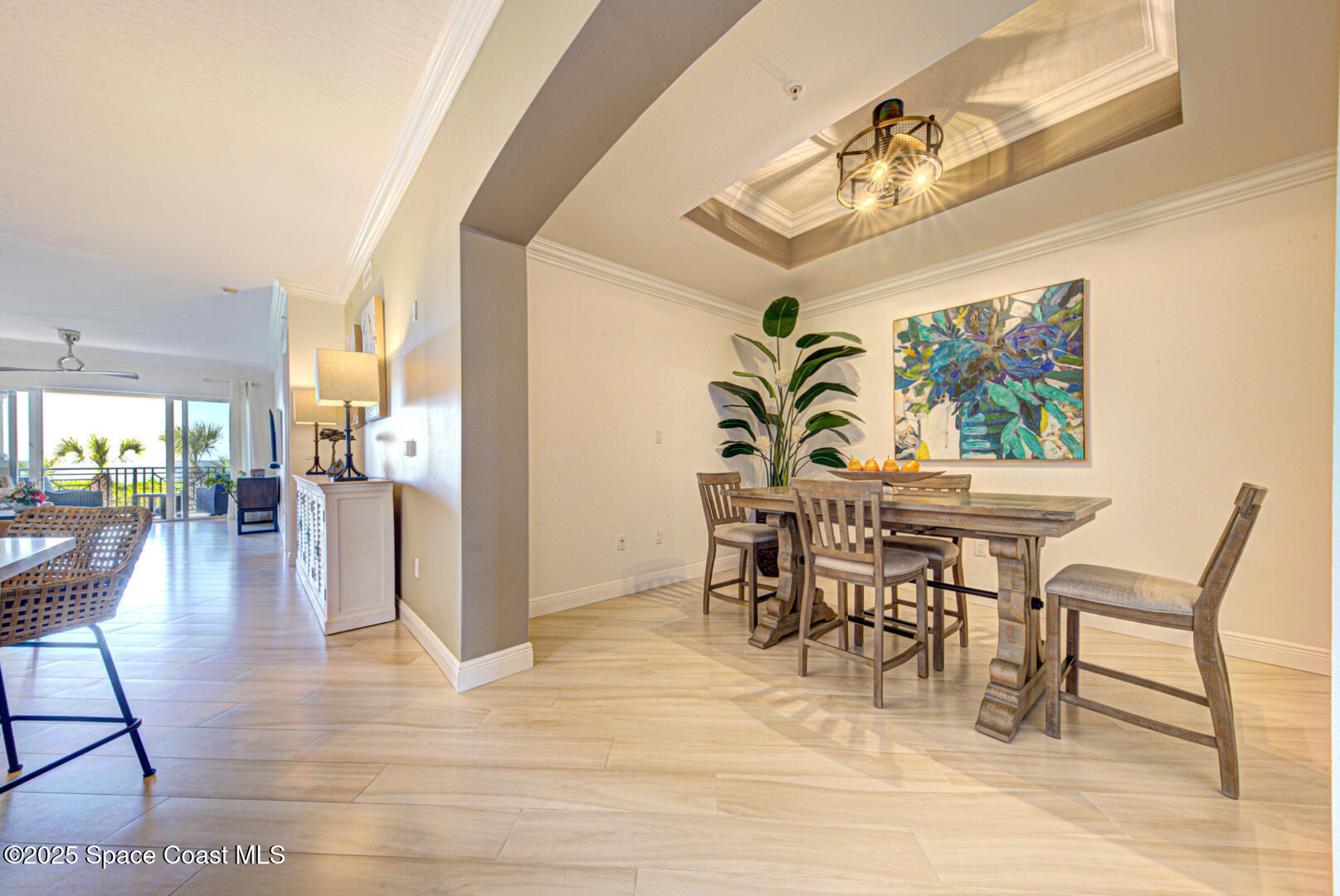2022 Julep Drive, Unit 105 Cocoa Beach, FL 32931 - Photo 13 of 67 dining room with stepped ceiling