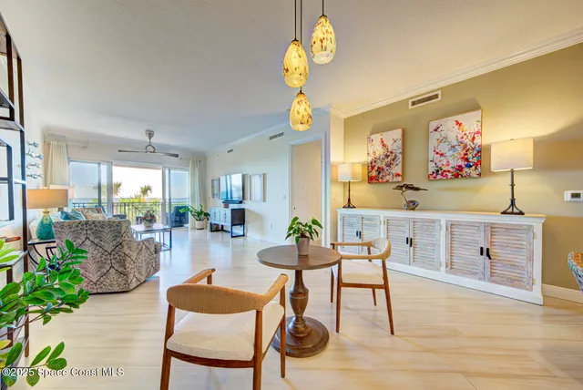 a living room with furniture fireplace and a flat screen tv