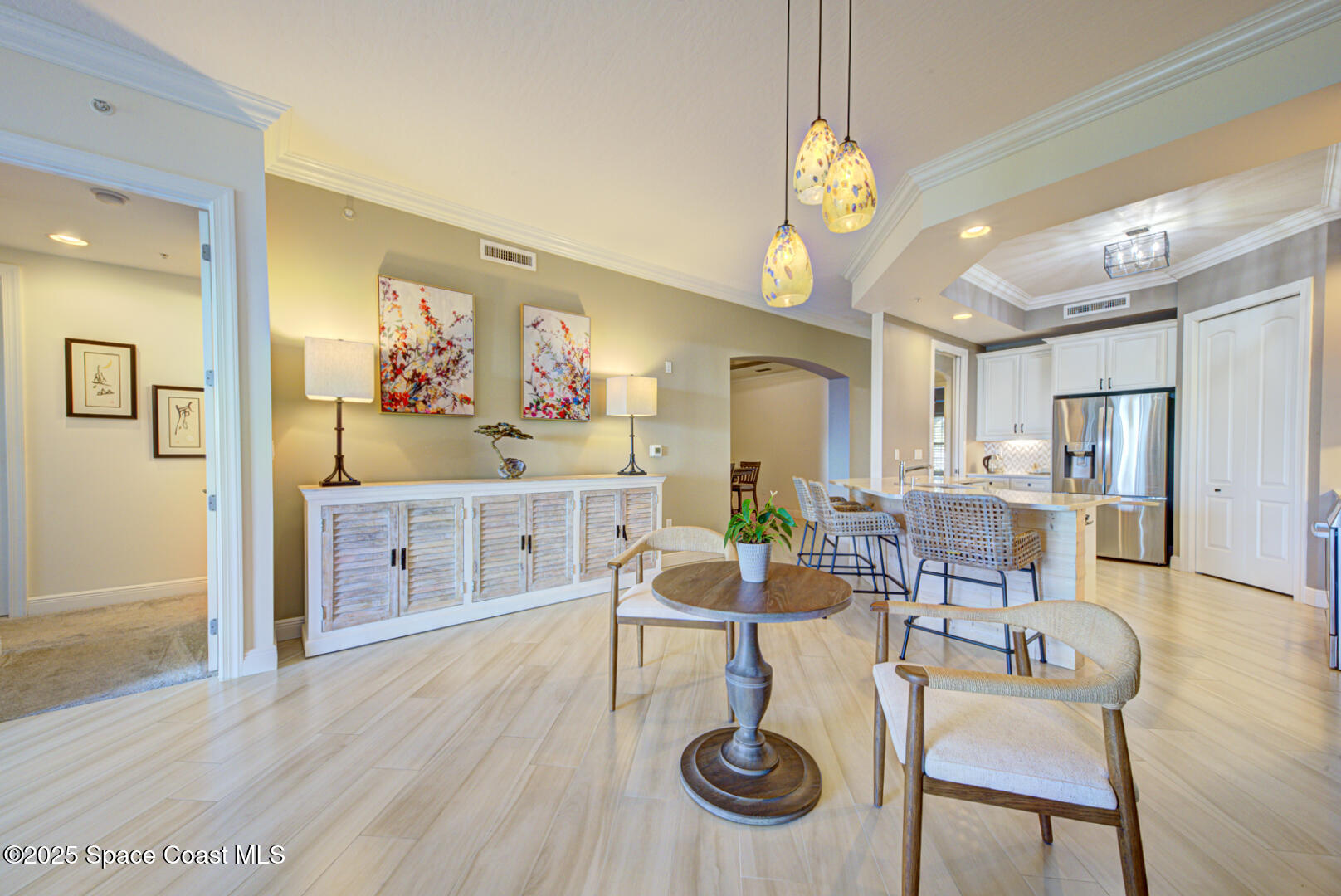 2022 Julep Drive, Unit 105 Cocoa Beach, FL 32931 - Photo 16 of 67 breakfast area with pendant light fixtur