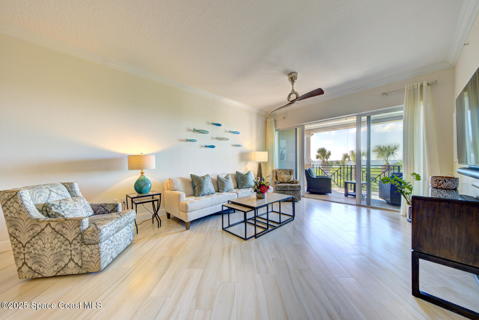 2022 Julep Drive, Unit 105 Cocoa Beach, FL 32931 - Photo 21 of 67 living room with river view (2)