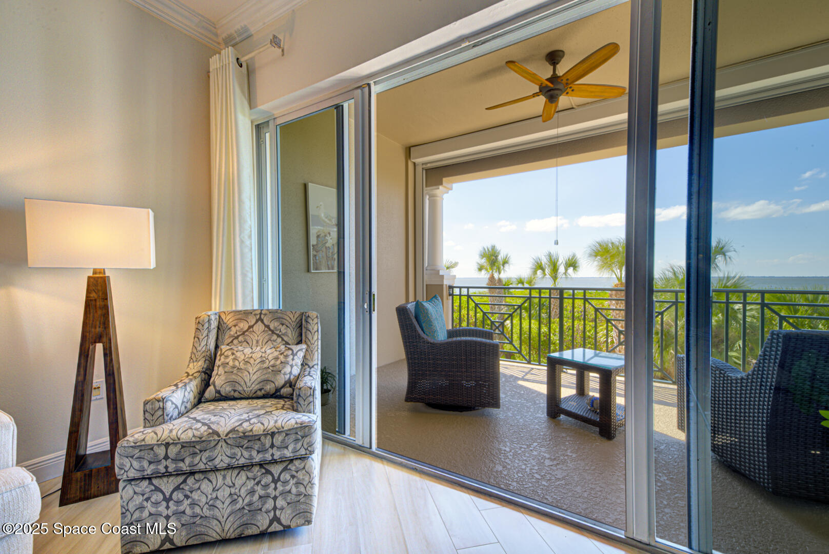 2022 Julep Drive, Unit 105 Cocoa Beach, FL 32931 - Photo 22 of 67 living room with balcony (4)