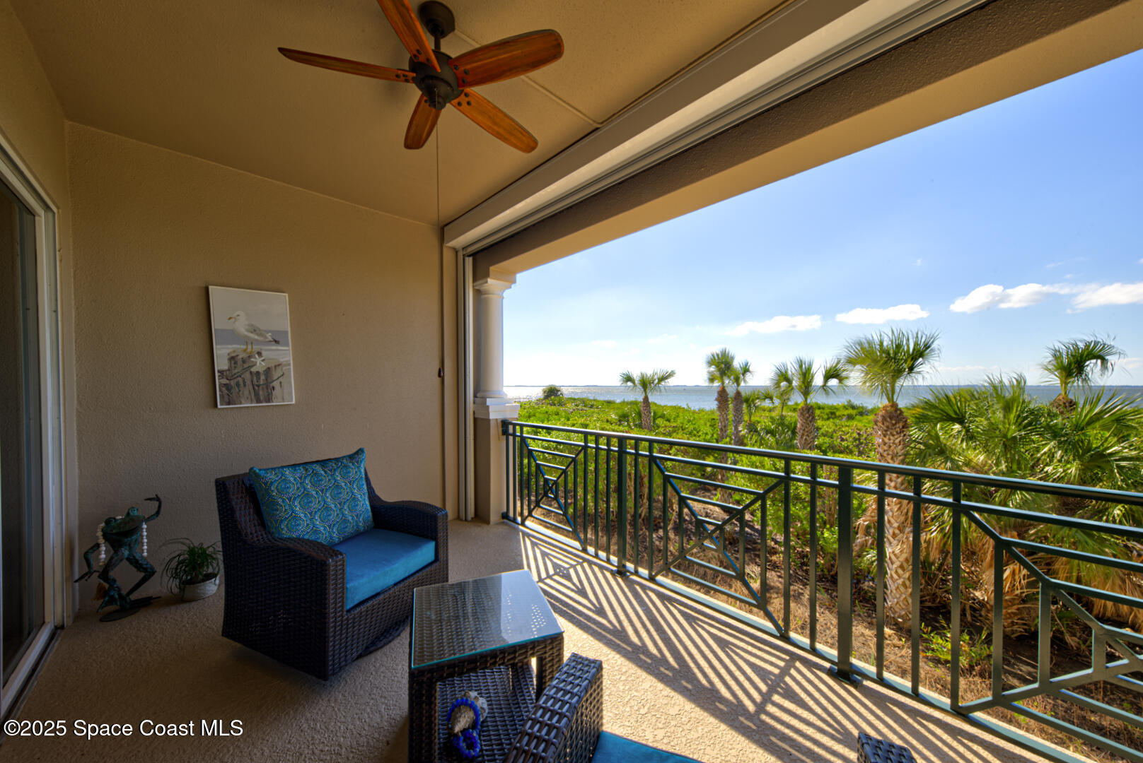 2022 Julep Drive, Unit 105 Cocoa Beach, FL 32931 - Photo 24 of 67 balcony with fan (2)