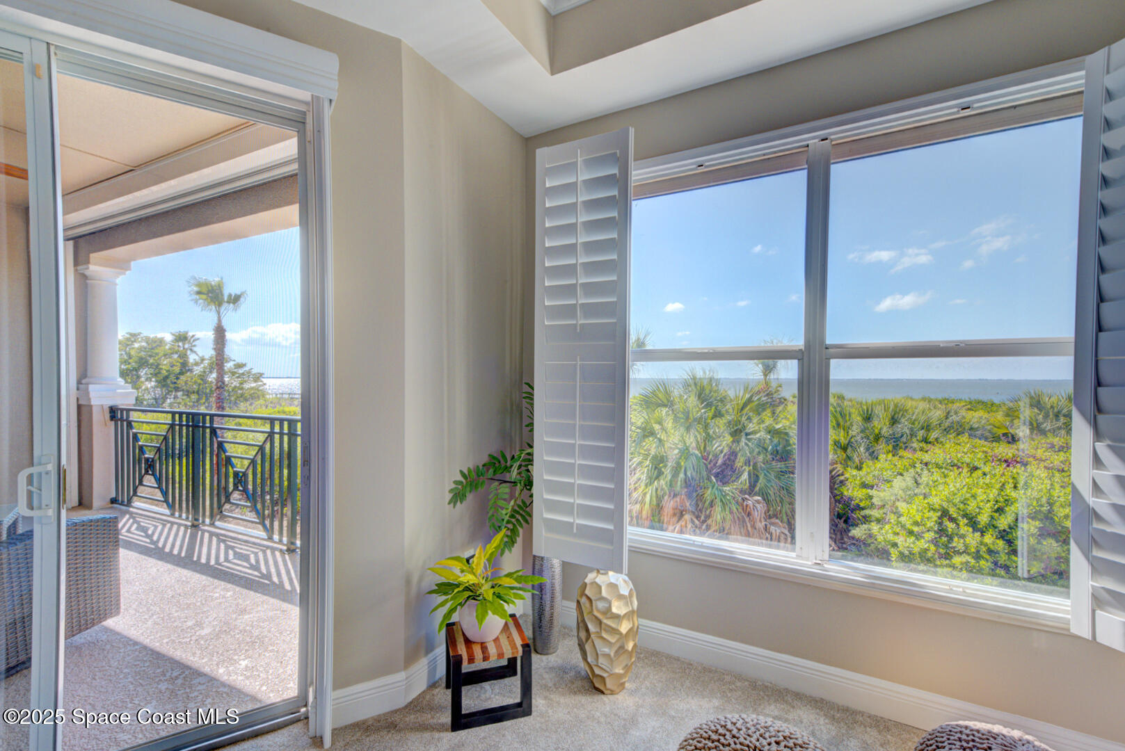 2022 Julep Drive, Unit 105 Cocoa Beach, FL 32931 - Photo 28 of 67 master bedroom with slider to balcony (4