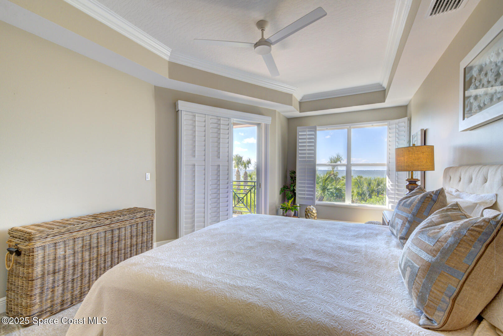 2022 Julep Drive, Unit 105 Cocoa Beach, FL 32931 - Photo 30 of 67 master bedroom with water view