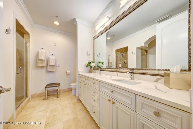 a spacious bathroom with a bathtub and shower