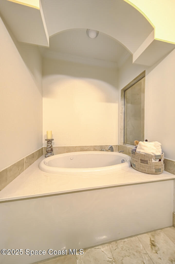 2022 Julep Drive, Unit 105 Cocoa Beach, FL 32931 - Photo 34 of 67 master bathroom tub (3)