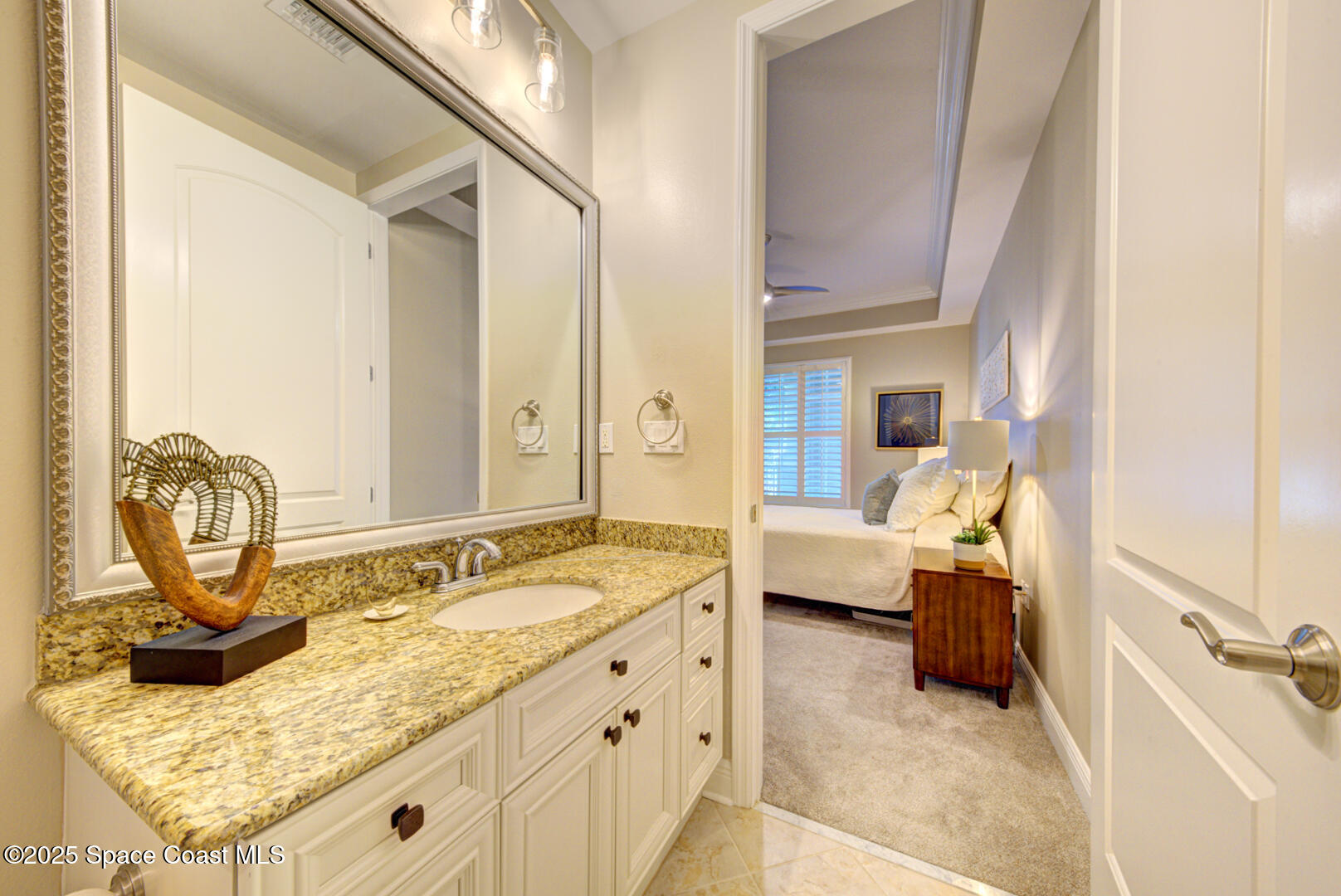 2022 Julep Drive, Unit 105 Cocoa Beach, FL 32931 - Photo 38 of 67 bedroom 2 ensuite vanity