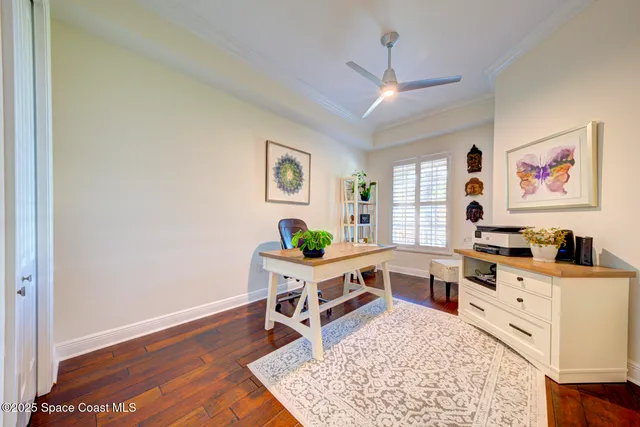 a dining room with wooden floor and breakfast area