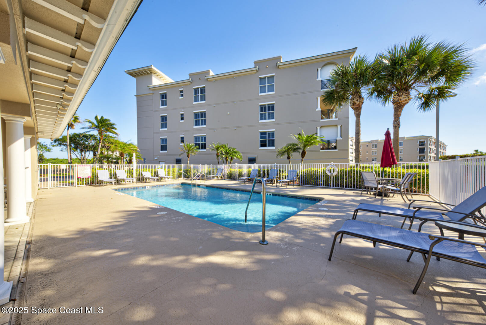 2022 Julep Drive, Unit 105 Cocoa Beach, FL 32931 - Photo 50 of 67 Magnolia Bay swimming pool