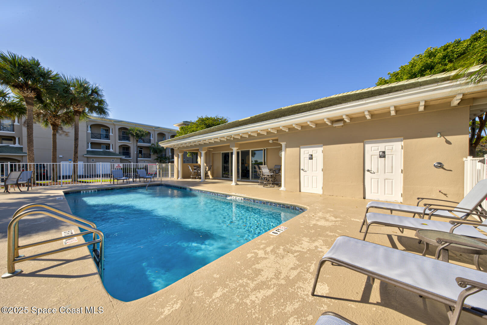 2022 Julep Drive, Unit 105 Cocoa Beach, FL 32931 - Photo 51 of 67 Magnolia Bay pool & clubhouse