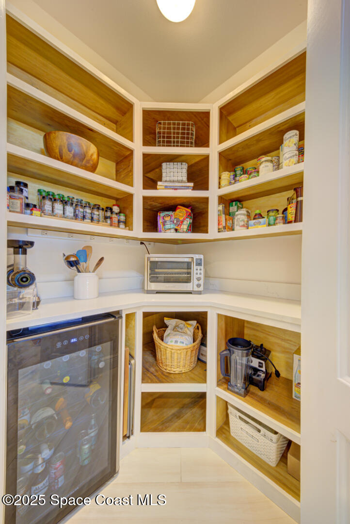 2022 Julep Drive, Unit 105 Cocoa Beach, FL 32931 - Photo 6 of 67 kitchen pantry (1)