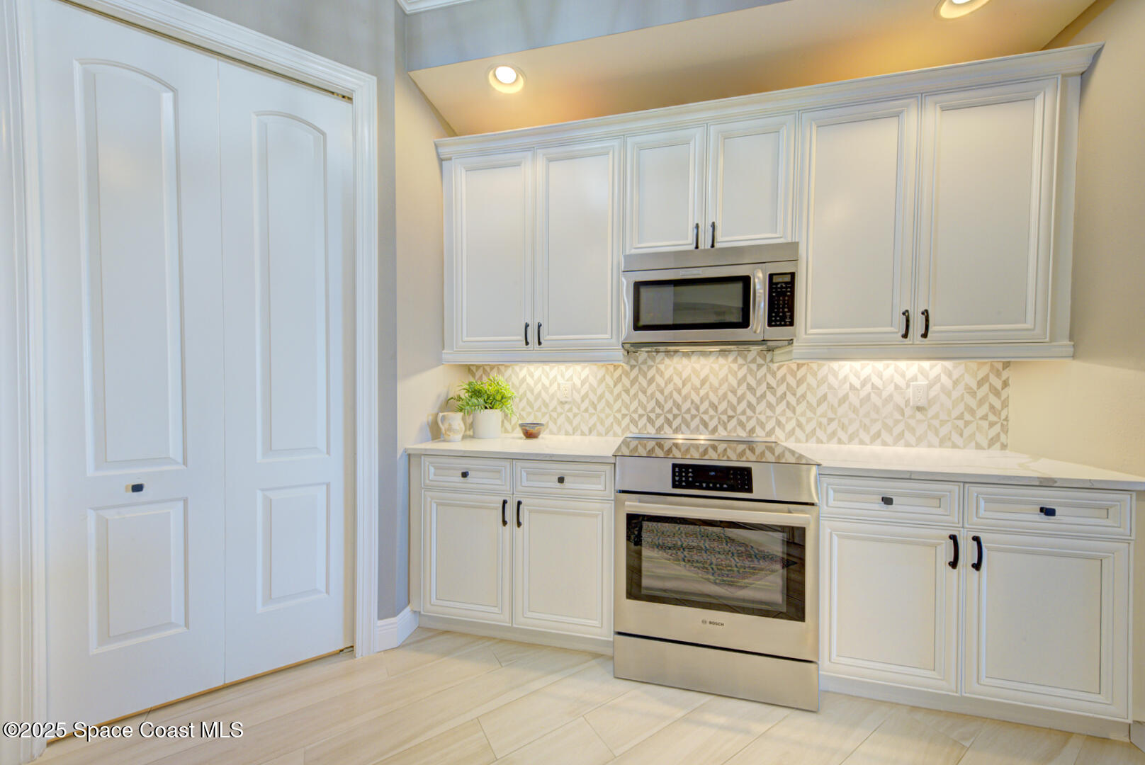 2022 Julep Drive, Unit 105 Cocoa Beach, FL 32931 - Photo 7 of 67 kitchen with under-cabinet lighting