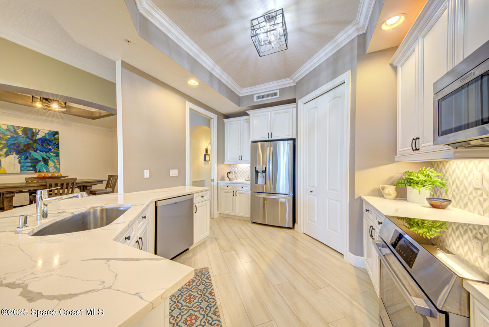 2022 Julep Drive, Unit 105 Cocoa Beach, FL 32931 - Photo 8 of 67 kitchen with stainless appliances