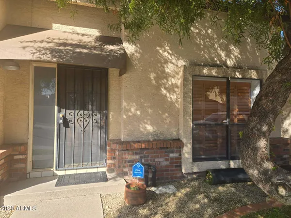 a view of a entrance gate of the house