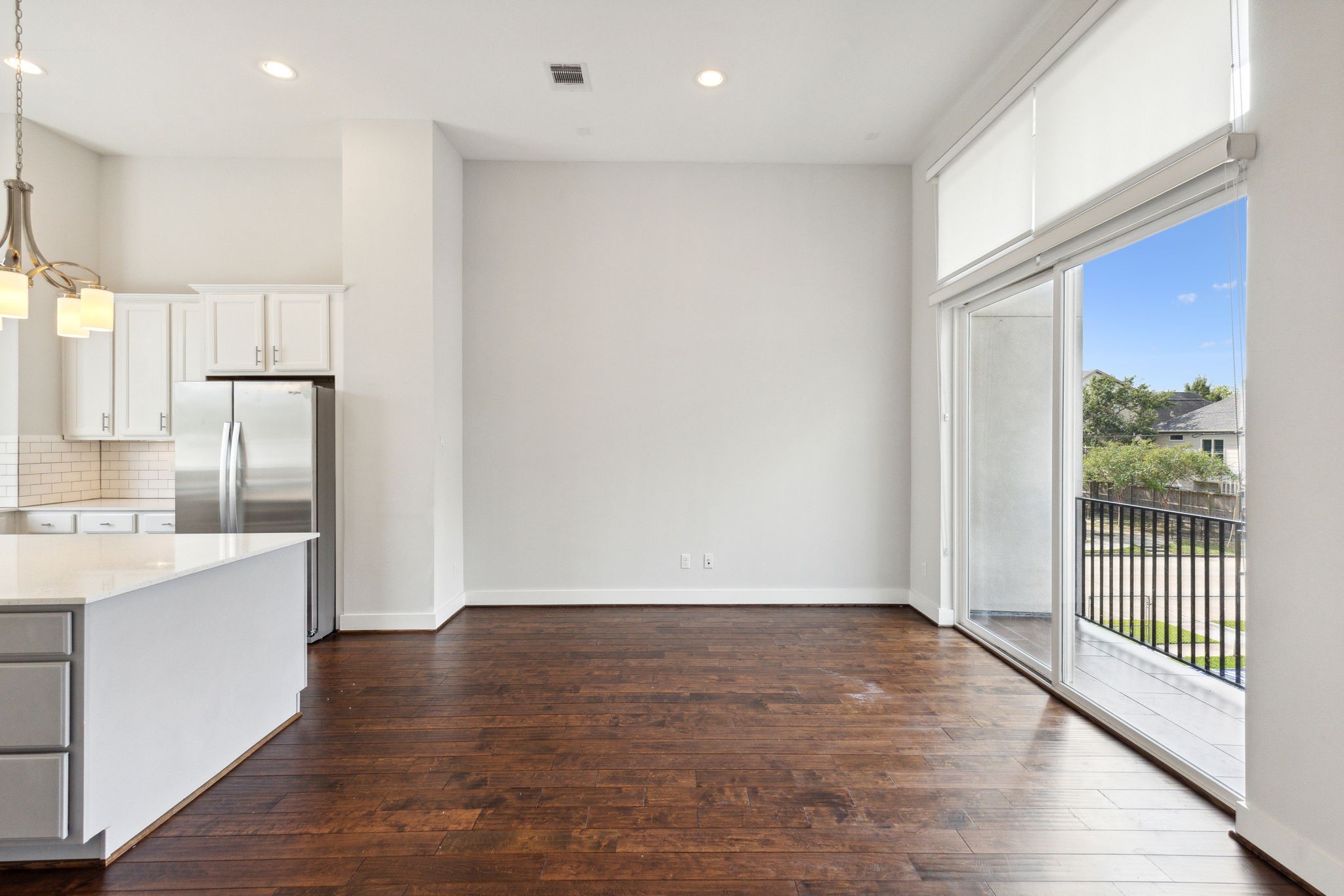843 West 23rd Street, Unit B Houston, TX 77008 - Photo 15 of 34 an empty room with wooden floor and windows