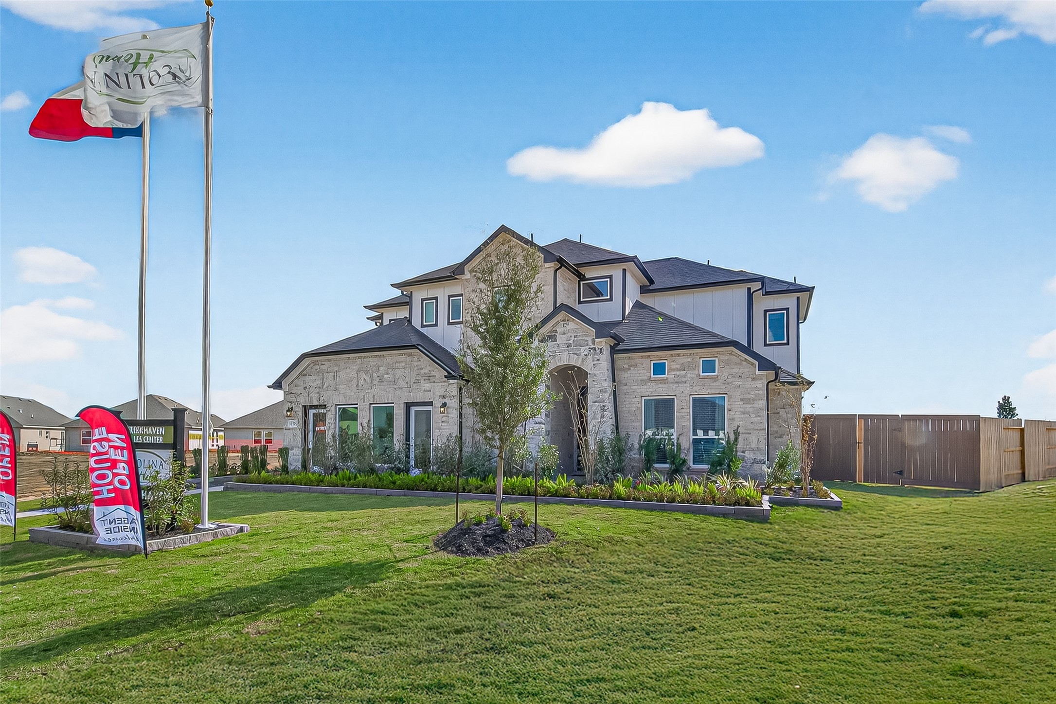 a front view of house with yard and outdoor seating