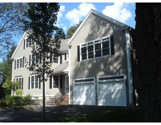 95 Reed Street Lexington, MA 02421 - Photo 1 of 8 a front view of a house with yard