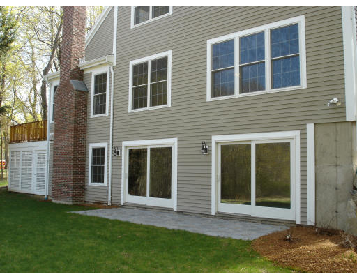 95 Reed Street Lexington, MA 02421 - Photo 8 of 8 a view front of house with a yard
