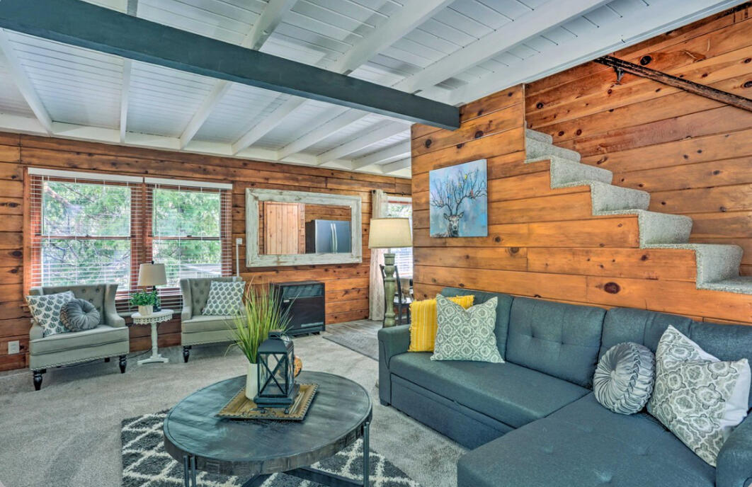 42036 Tollhouse Road Shaver Lake, CA 93664 - Photo 7 of 30 a living room with furniture fireplace and a large window