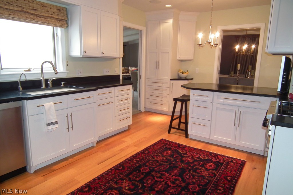 2671 Rochester Road Shaker Heights, OH 44122 - Photo 2 of 22 Gourmet kitchen with premium maple cabinets, upscale stainless steel appliances and granite countertops