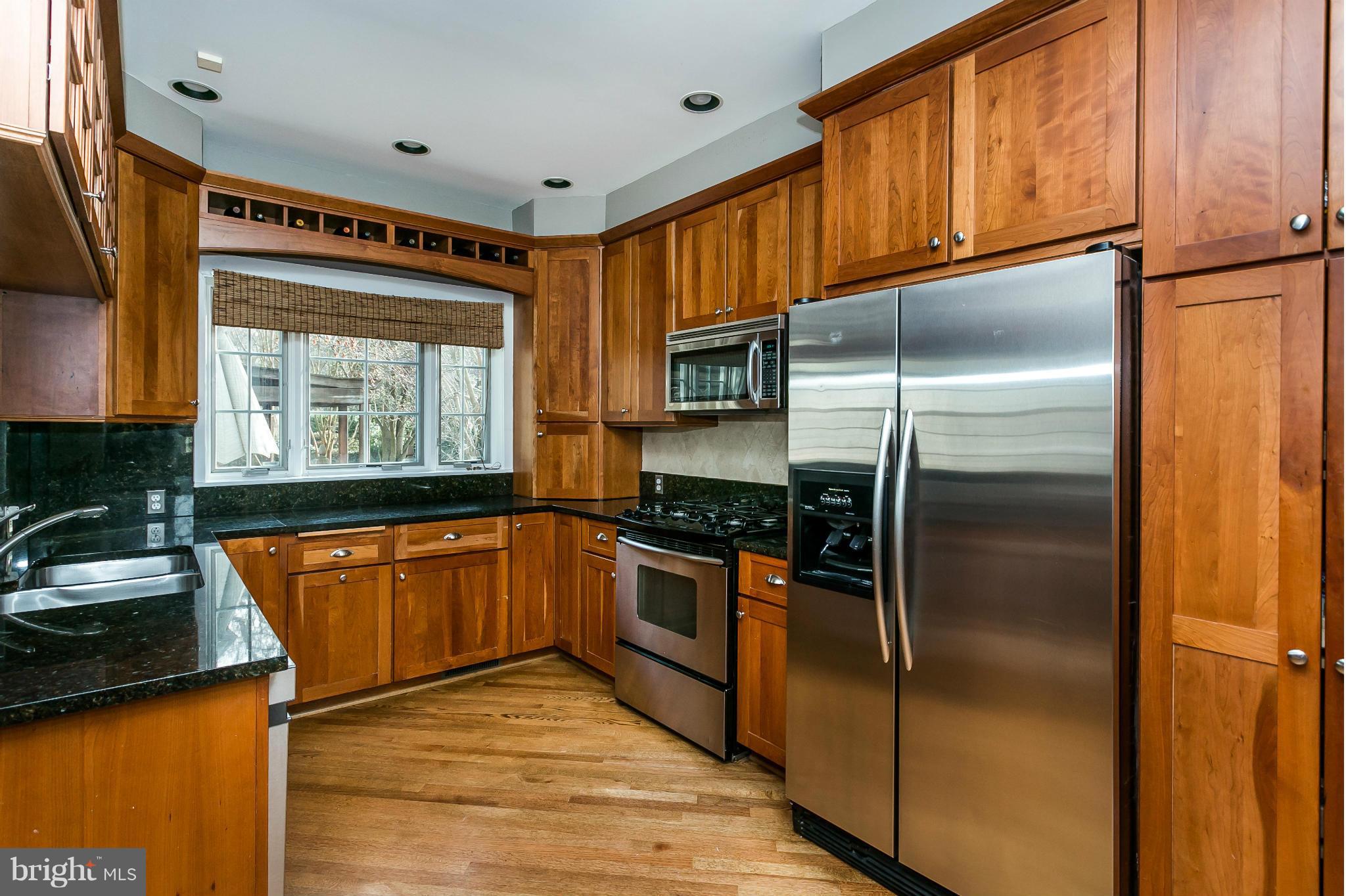 5620 Pimlico Road Baltimore, MD 21209 - Photo 12 of 30 Custom cherry cabinets, tons of counter space