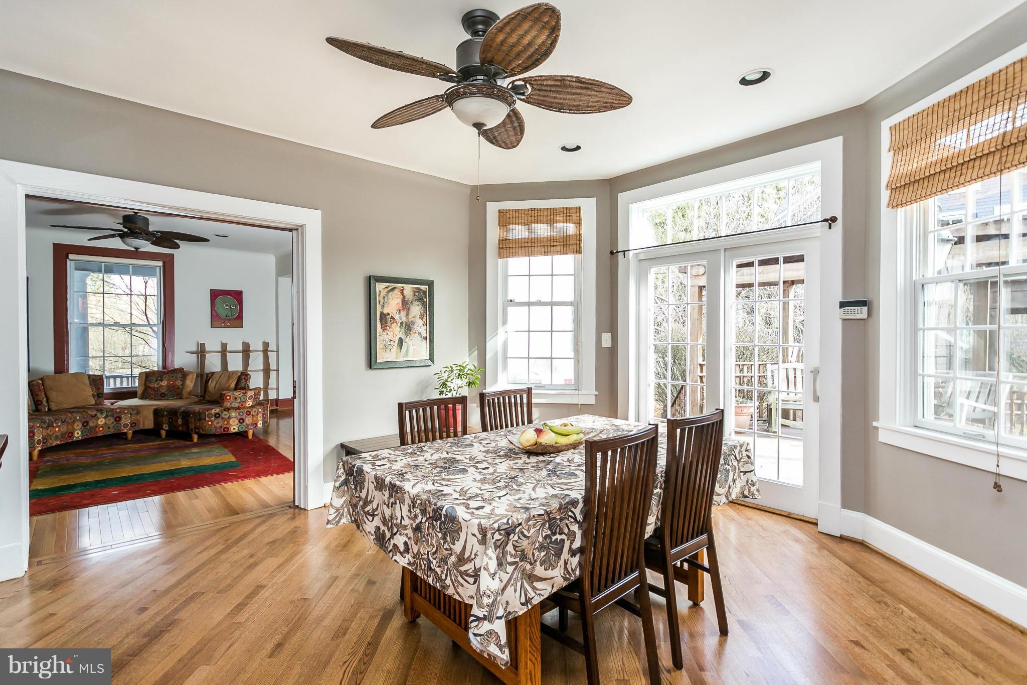 5620 Pimlico Road Baltimore, MD 21209 - Photo 8 of 30 Bright dining room leads to side deck