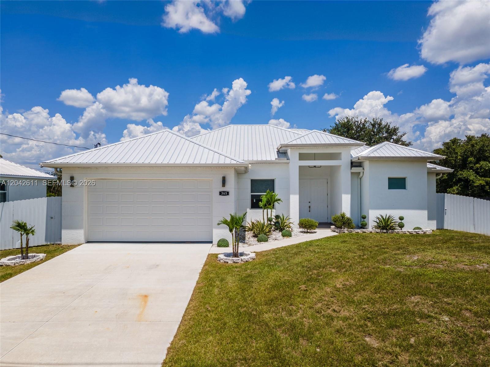365 Ranier Avenue Lehigh Acres, FL 33974 - Photo 2 of 50