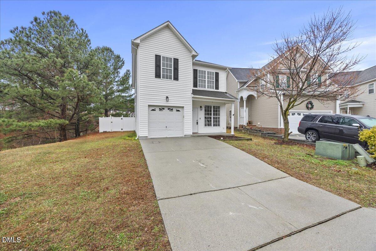 3831 Pin Oak Road Raleigh, NC 27604 - Photo 28 of 28 a view of house with yard