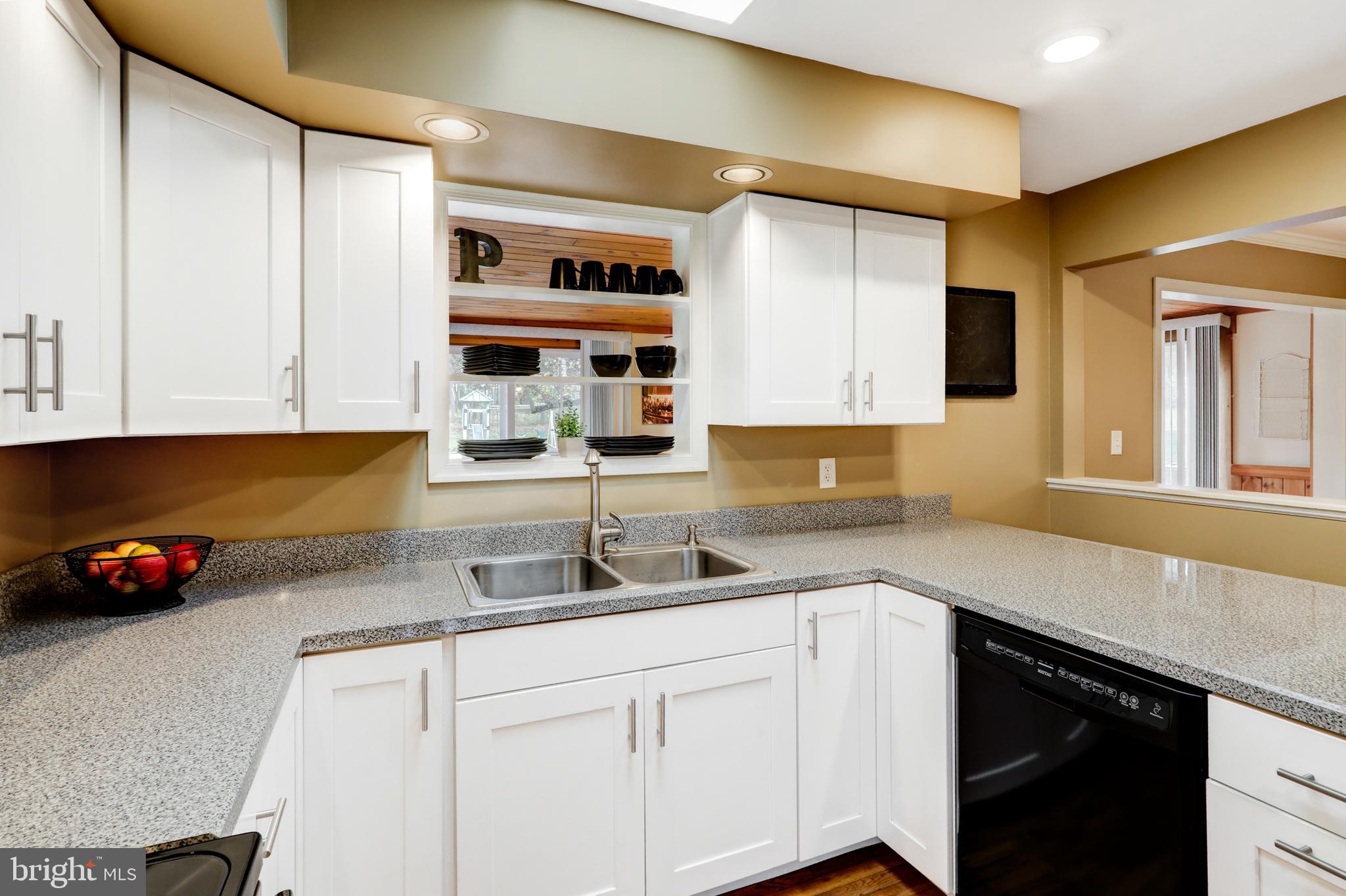 2771 Camp Road Manheim, PA 17545 - Photo 11 of 45 a kitchen with granite countertop a sink and cabinets