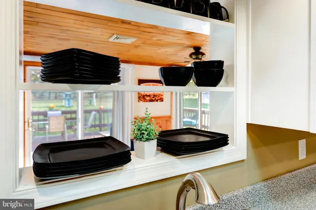 a kitchen with a stove and a microwave