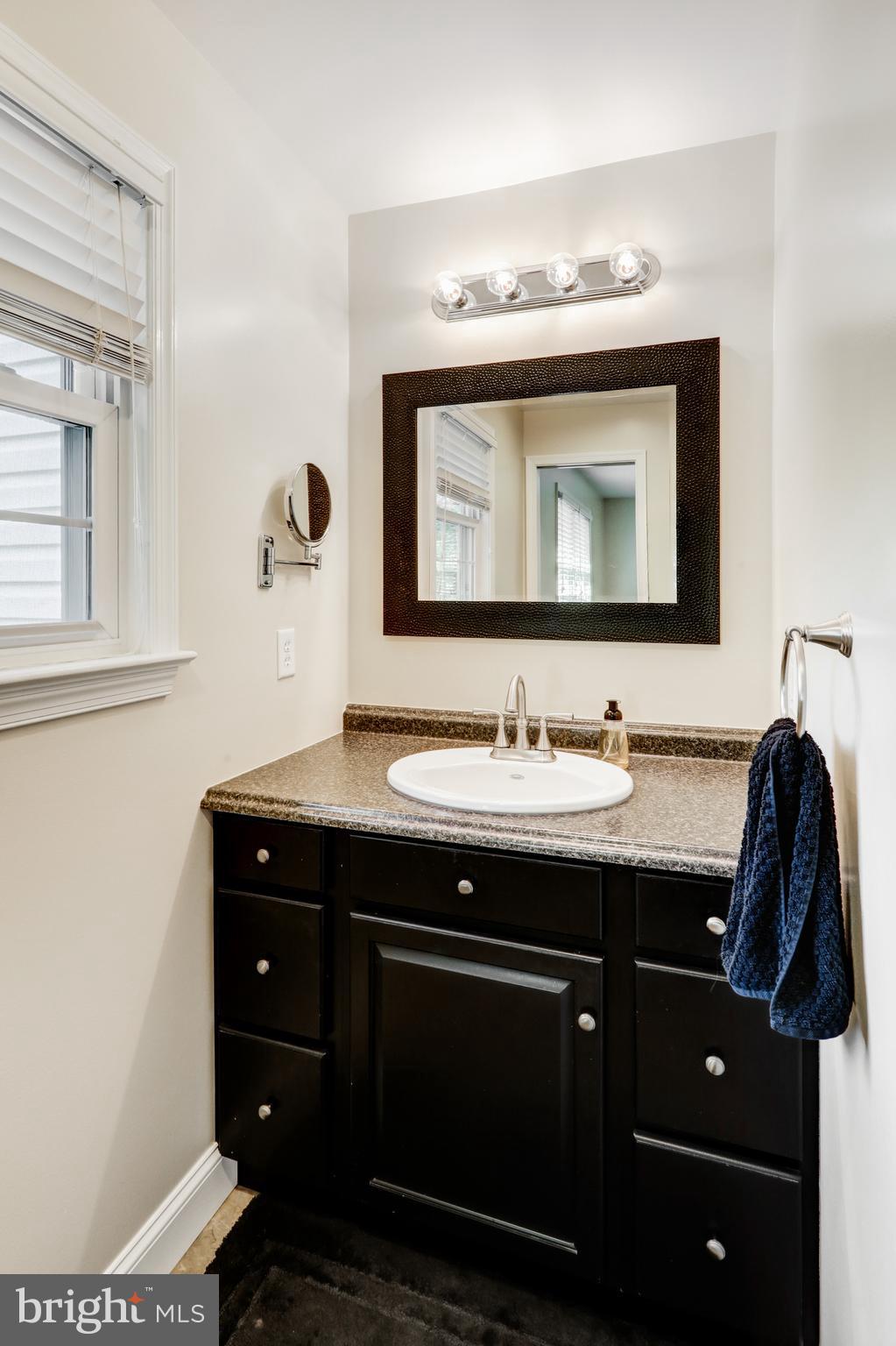 2771 Camp Road Manheim, PA 17545 - Photo 22 of 45 a bathroom with a sink vanity and mirror