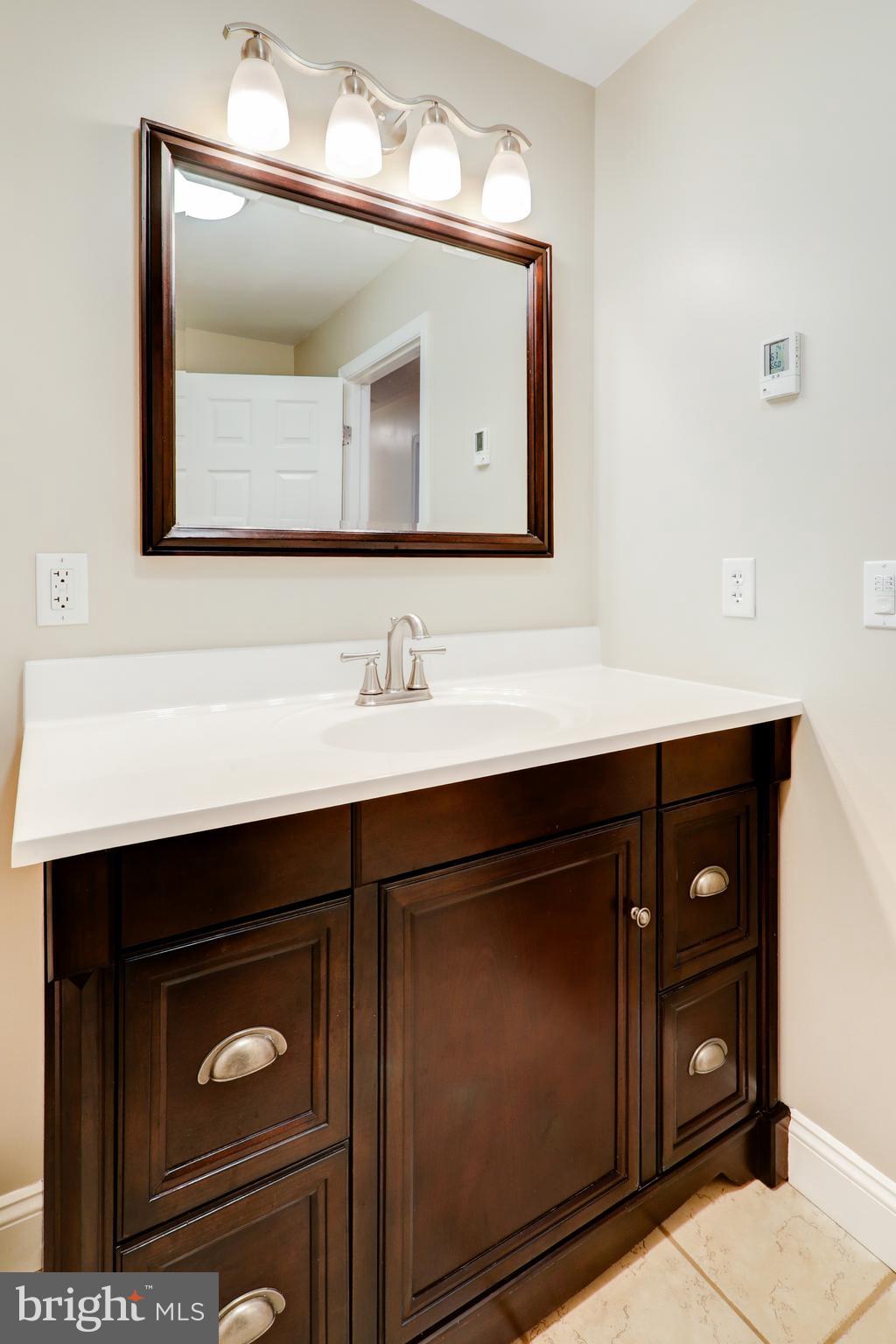 2771 Camp Road Manheim, PA 17545 - Photo 28 of 45 a bathroom with a sink vanity and mirror