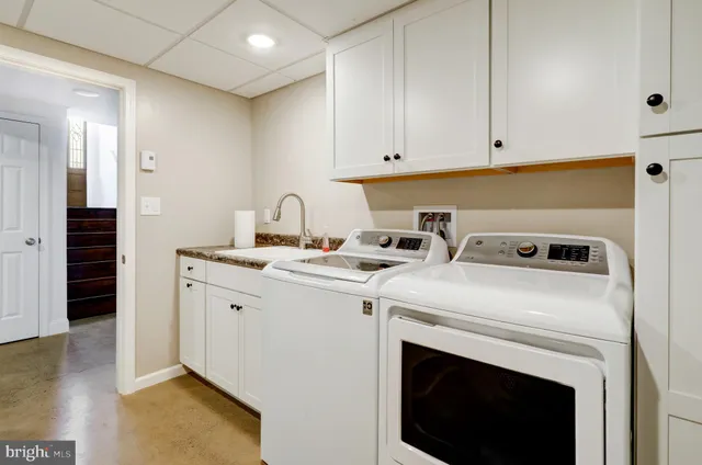 a bathroom with a sink and a shower