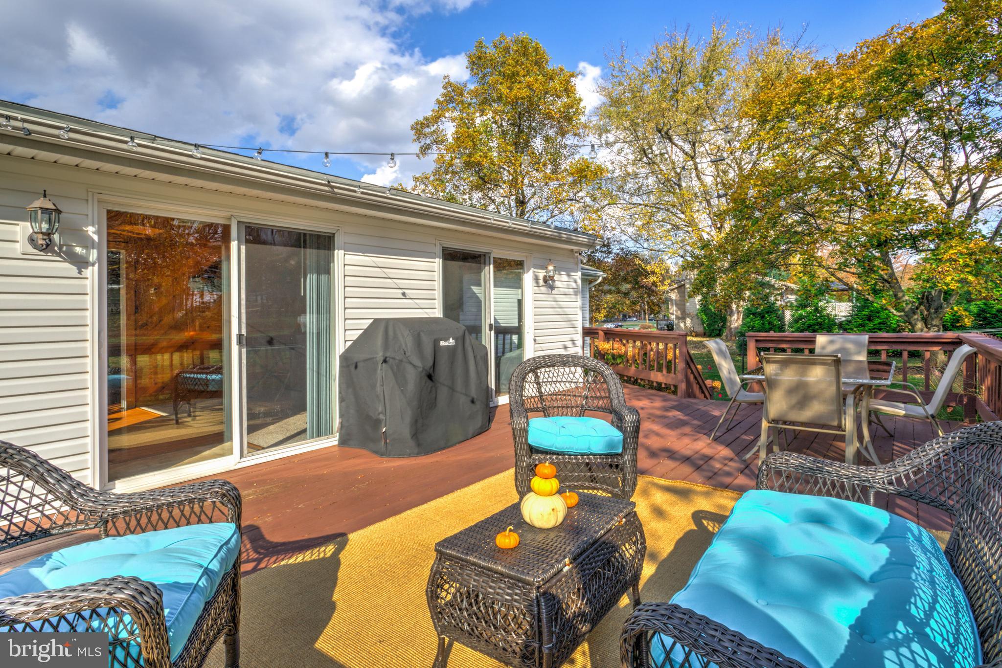 2771 Camp Road Manheim, PA 17545 - Photo 37 of 45 a view of a patio with couches table and chairs and wooden fence
