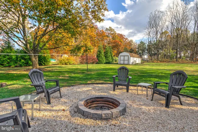 a view of a playground with basketball court