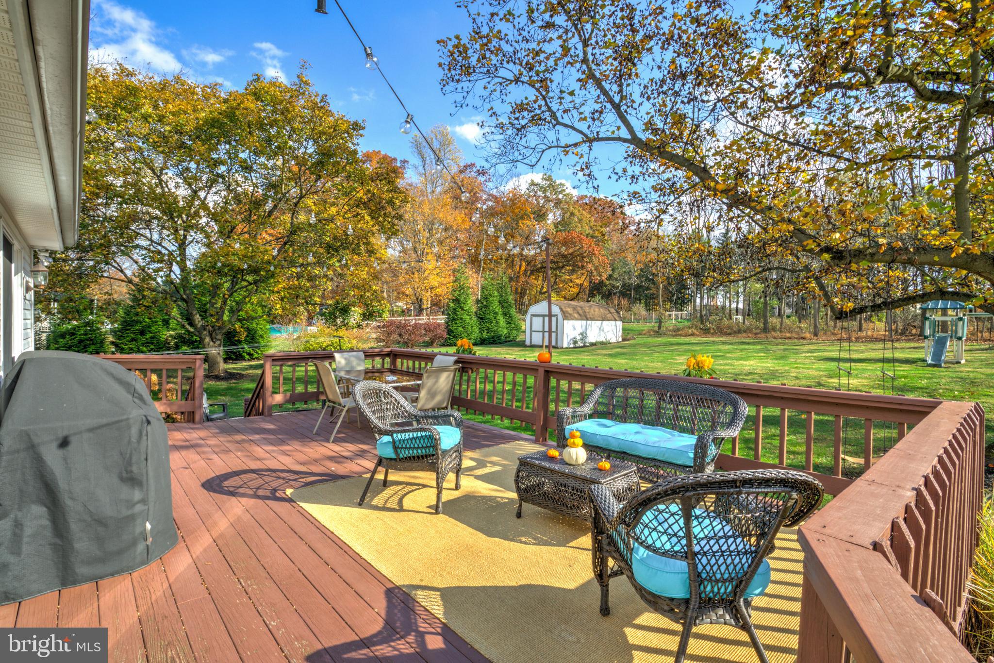 2771 Camp Road Manheim, PA 17545 - Photo 43 of 45 a view of a patio with couches chairs and a wooden floor