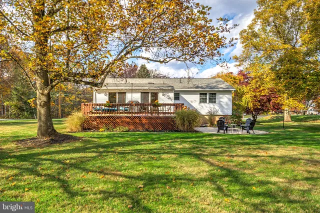 a view of a house with a back yard