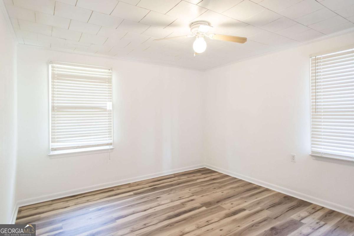 1329 Gorman Road Waycross, GA 31503 - Photo 16 of 23 an empty room with a window