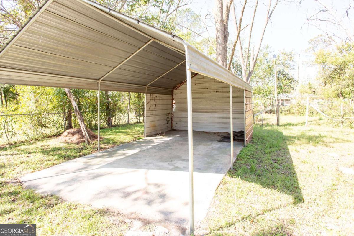 1329 Gorman Road Waycross, GA 31503 - Photo 21 of 23 a view of a backyard